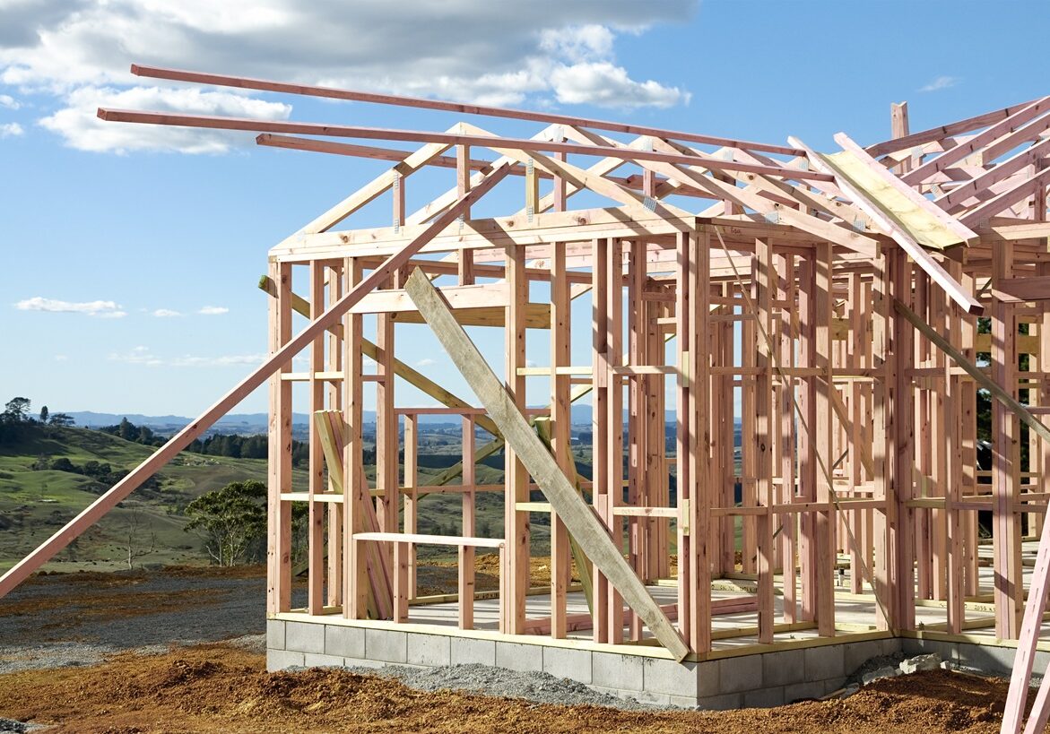 House Building in the Country Timber frame construction of a house in rural New Zealand.